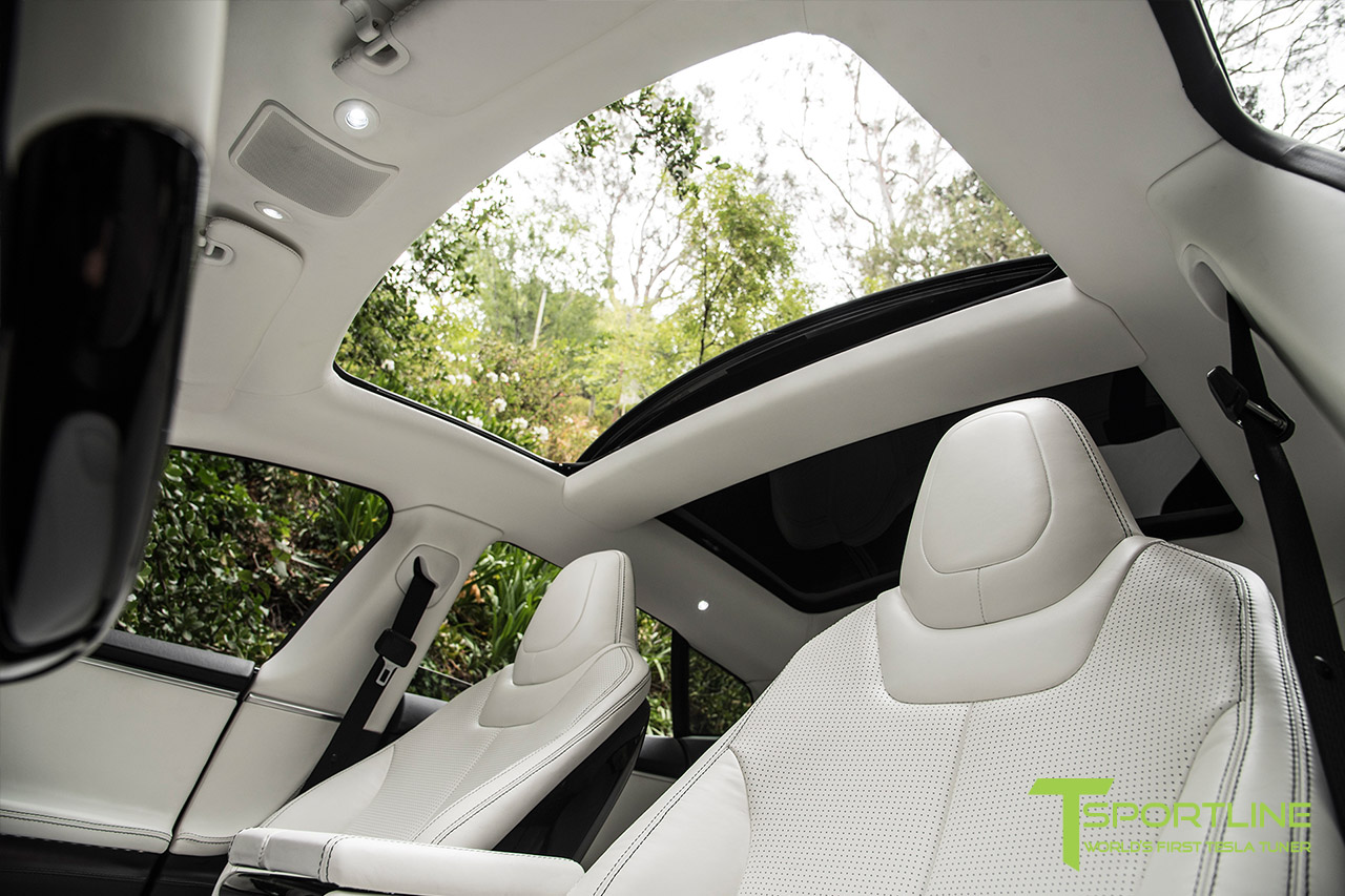 11 tesla-model-s-custom-ferrari-white-interior-piano-black-steering-wheel.jpg