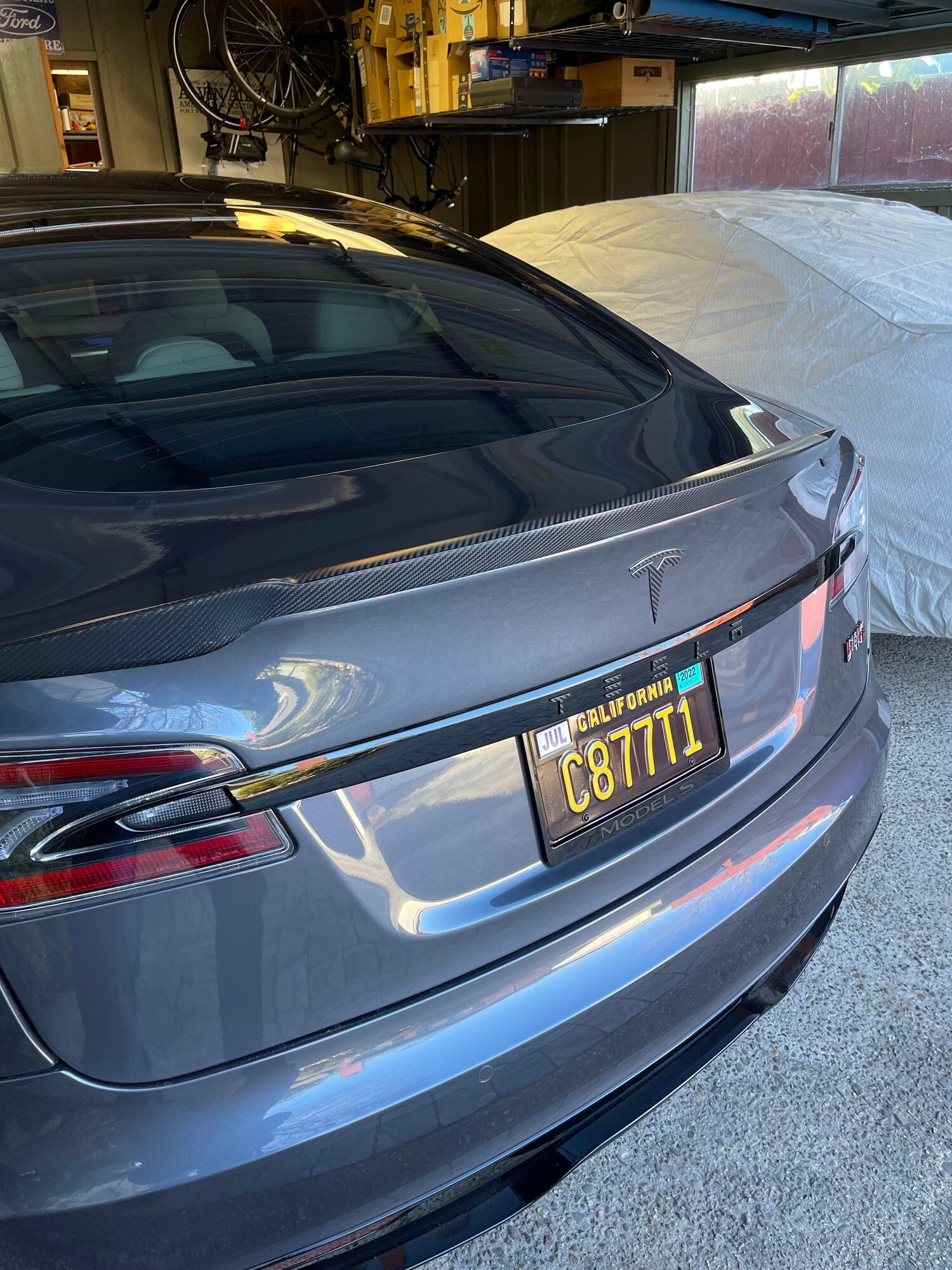 Easiest way to black out Tesla emblem (front and back)?