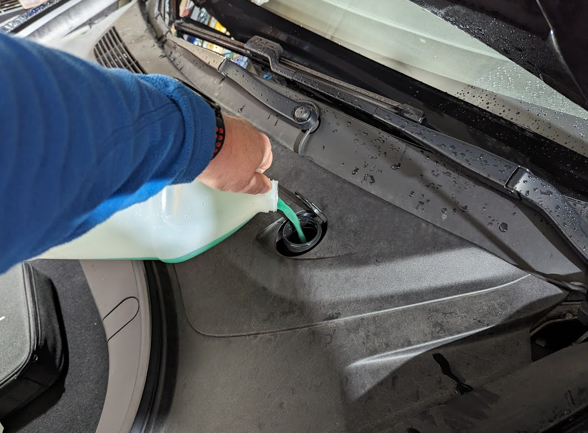 a long tube rather than a funnel to add windshield washer fluid?