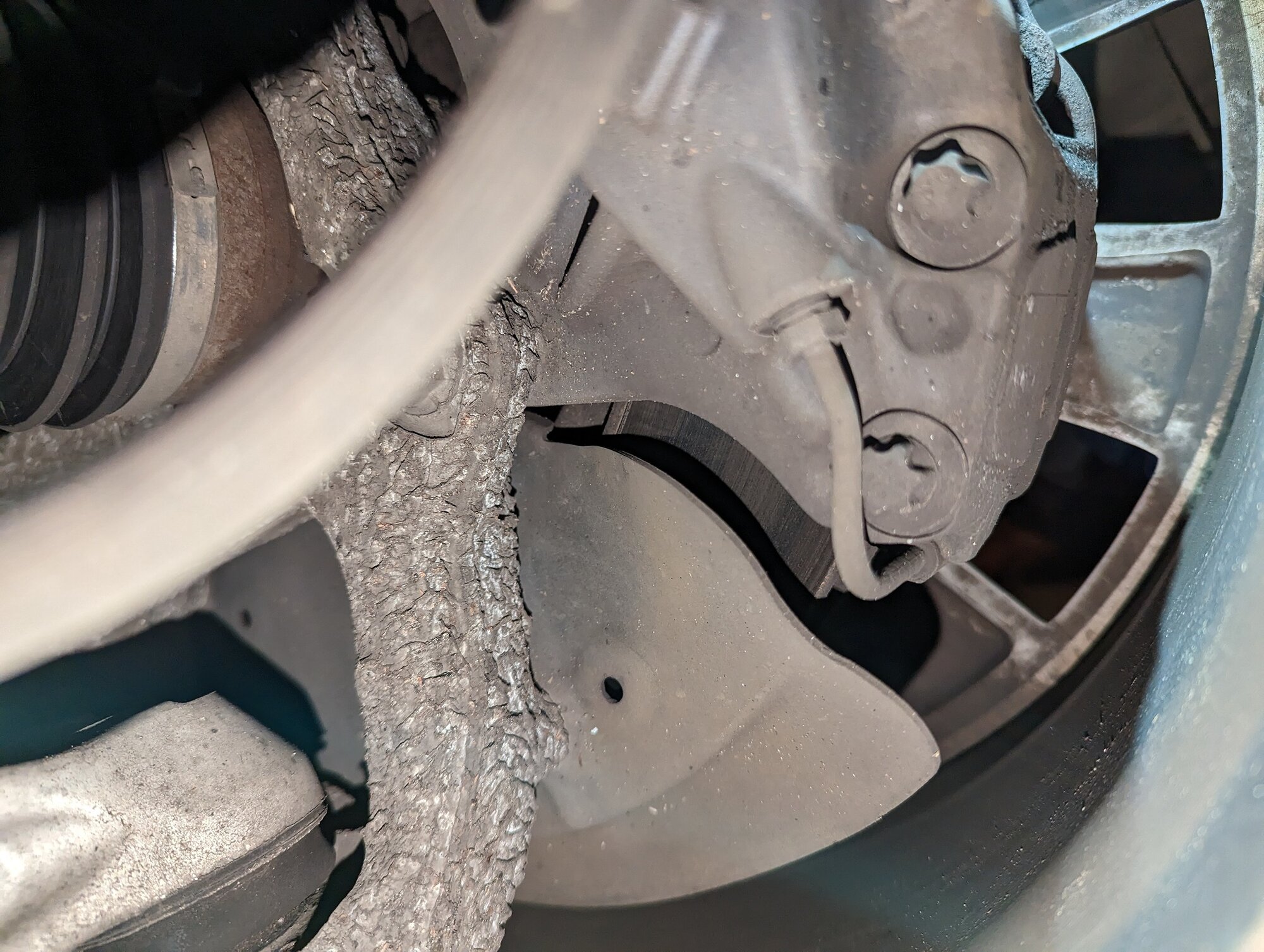 2017 Model X suspension corrosion passenger front.jpg