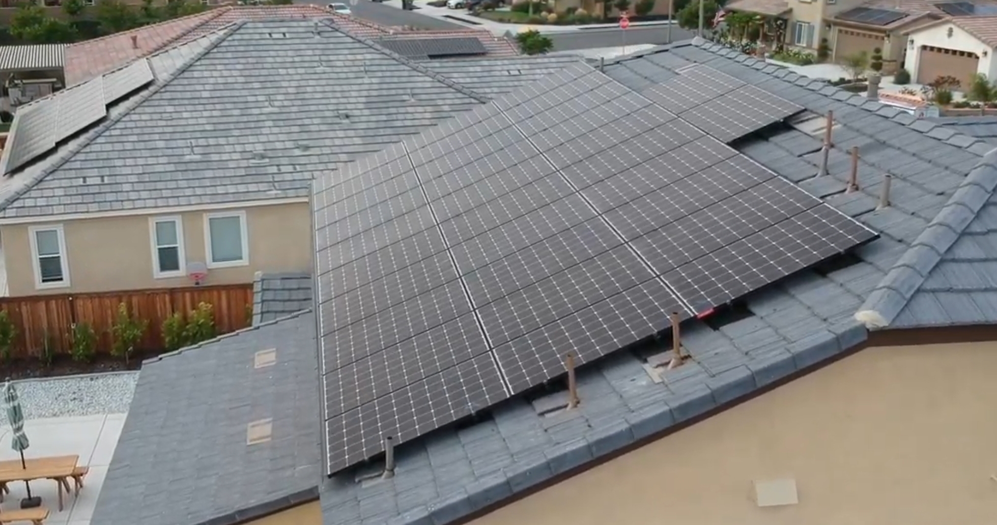Understanding Solar Roofs vs Solar Panels - Baker Home Energy