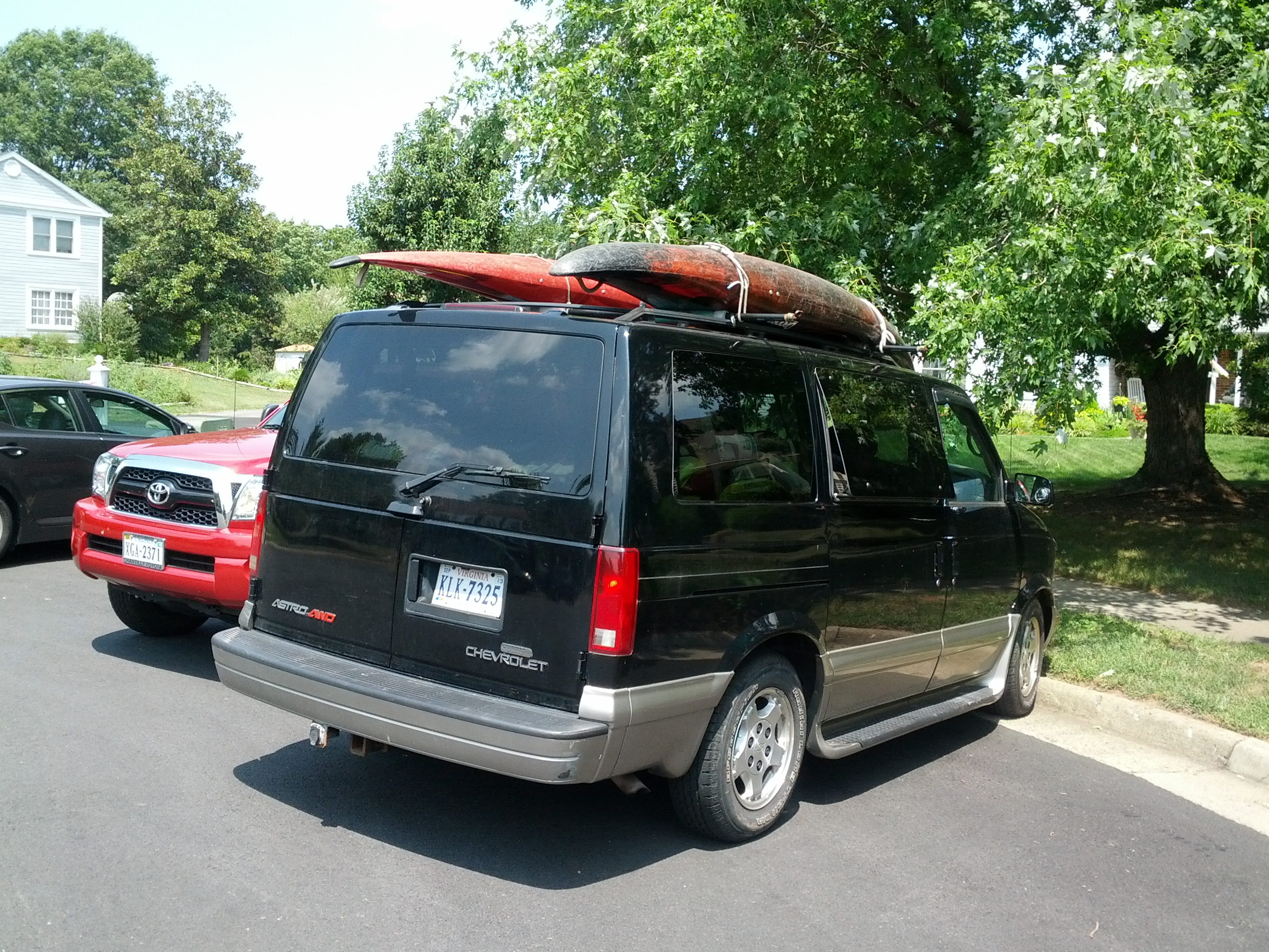 Astro With Boats On RoofRacks 1.jpg