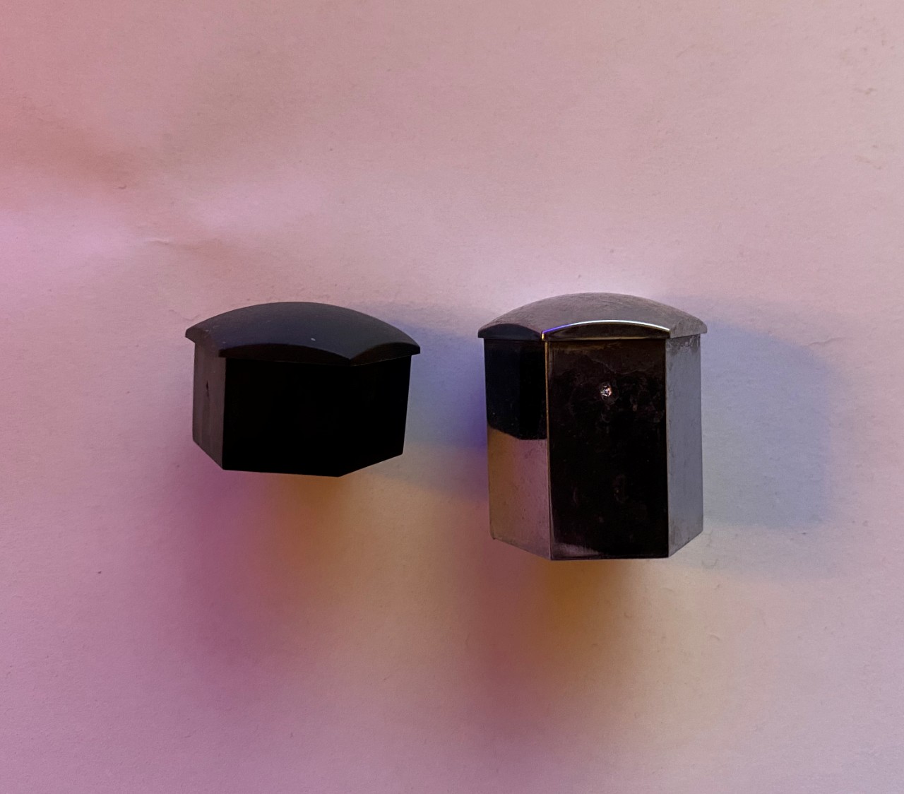Model 3 (left) vs. Model X lug nut covers