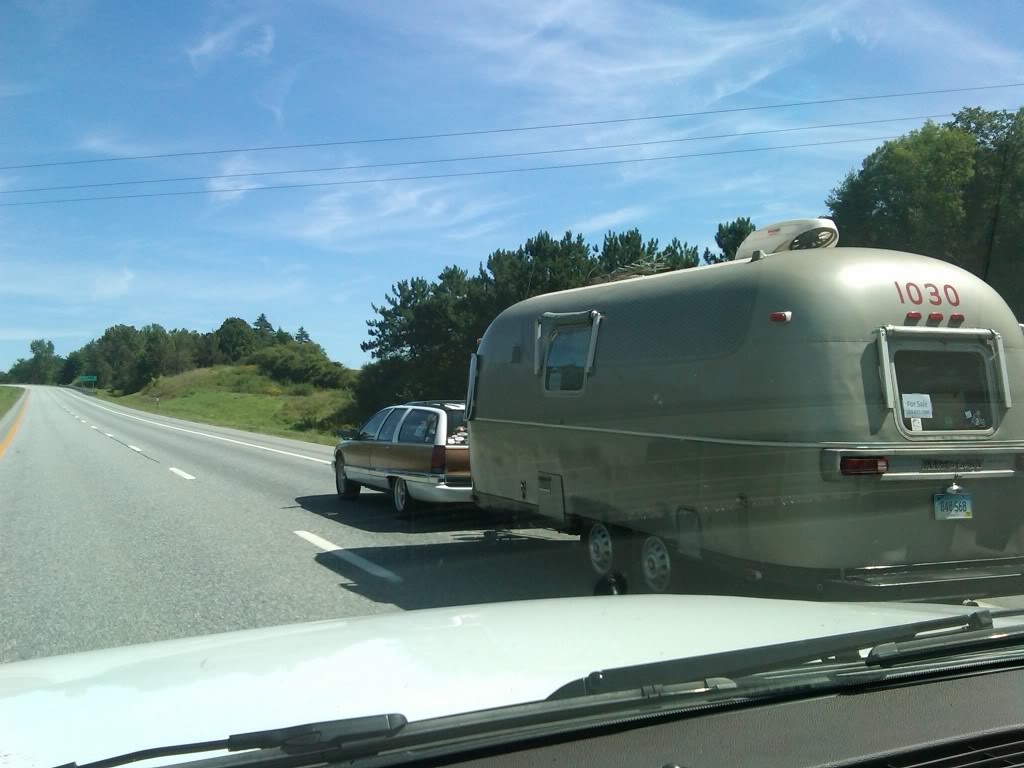 Family sedan towing 31 foot camper.jpg