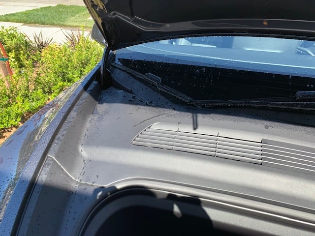 Water inside the front hood