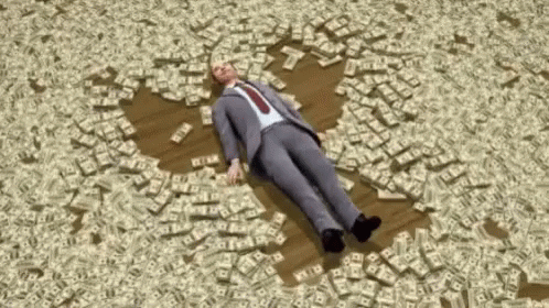 guy-in-corporate-suit-swimming-in-money.gif
