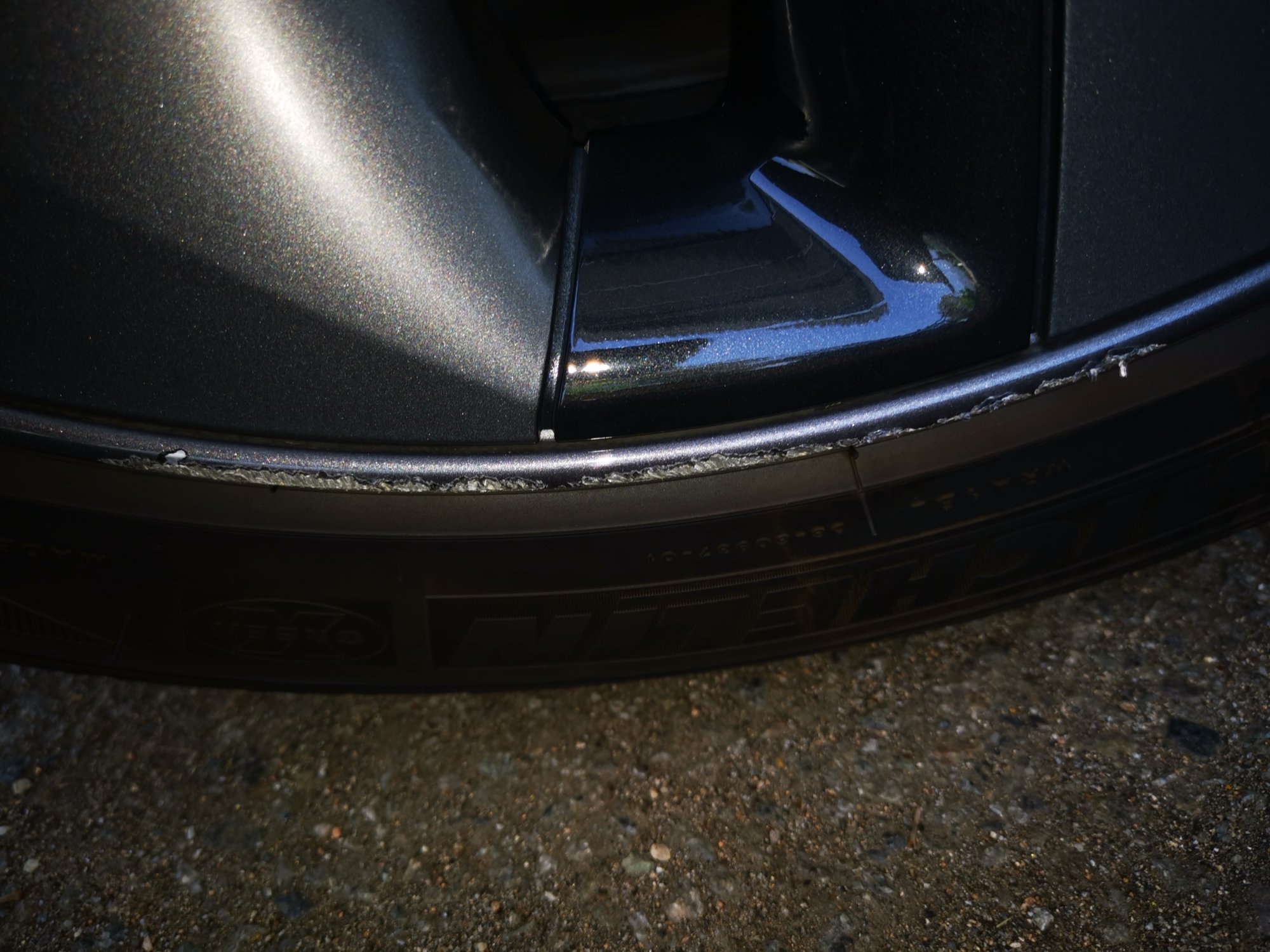 I scratched my car driving onto the curb- WHAT TO DO HELP PLEASE