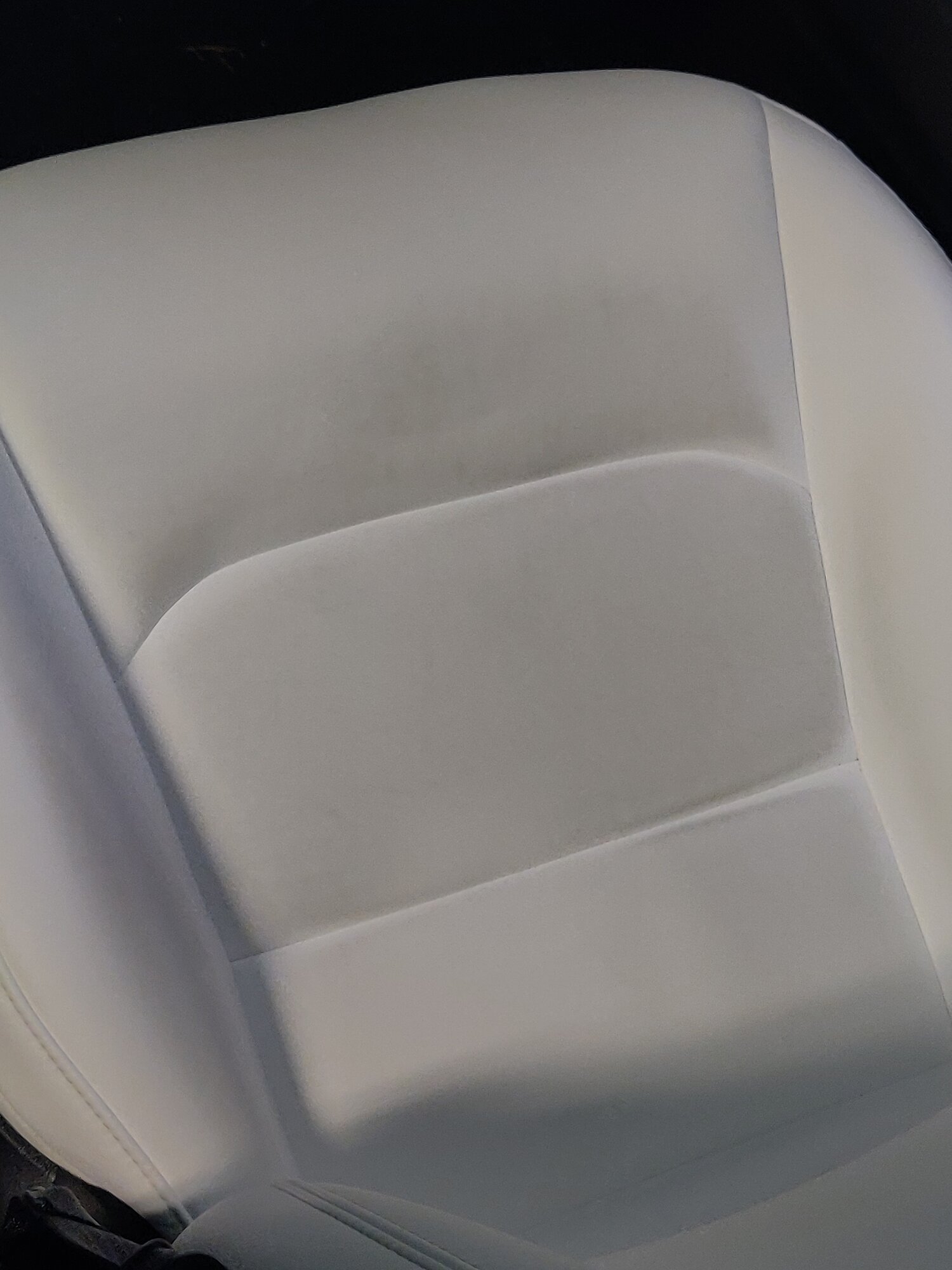 Cleaning / removing sunscreen sunscreen and white marks / stains off vegan  leather black seats?