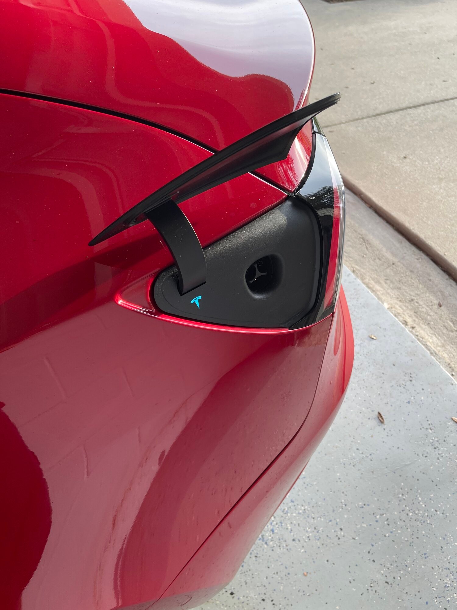 Charging port staying open | Tesla Motors Club