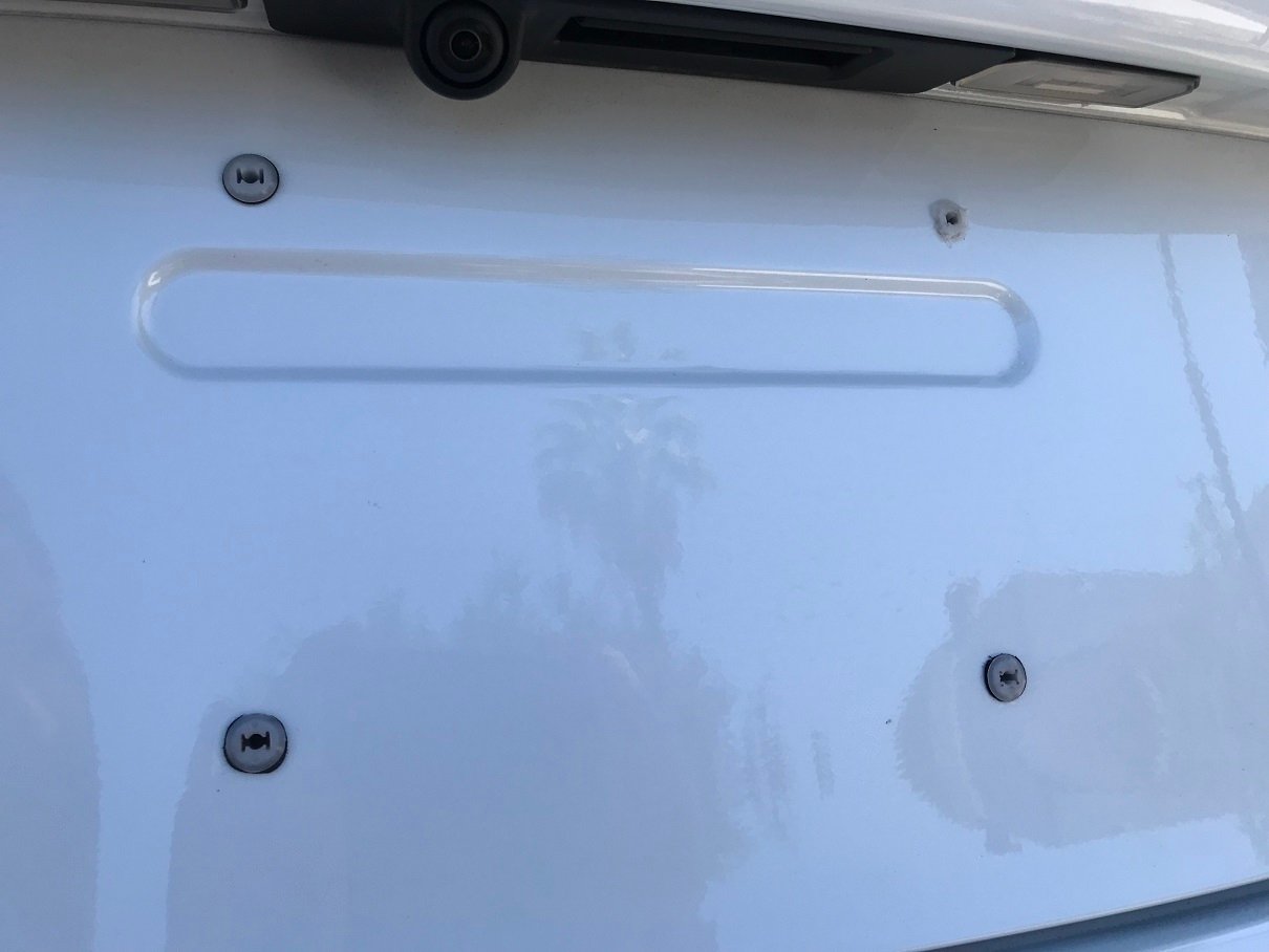 Rear license plate screw stripped? | Page 2 | Tesla Motors Club