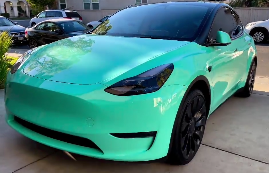 Tesla Model Y wrapped in FUZED Gloss Smaragd Green - Colored Paint  Protection Film