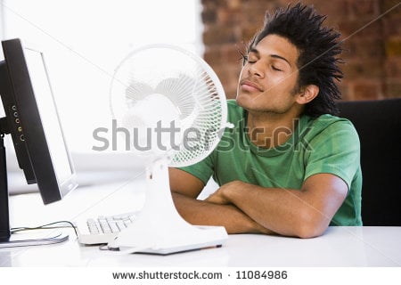 stock-photo-office-working-with-electric-fan-11084986.jpg