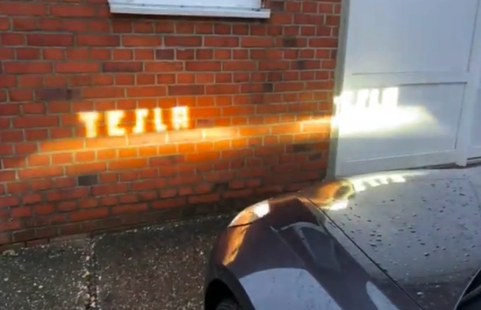 tesla-logo-projector-lights.jpg