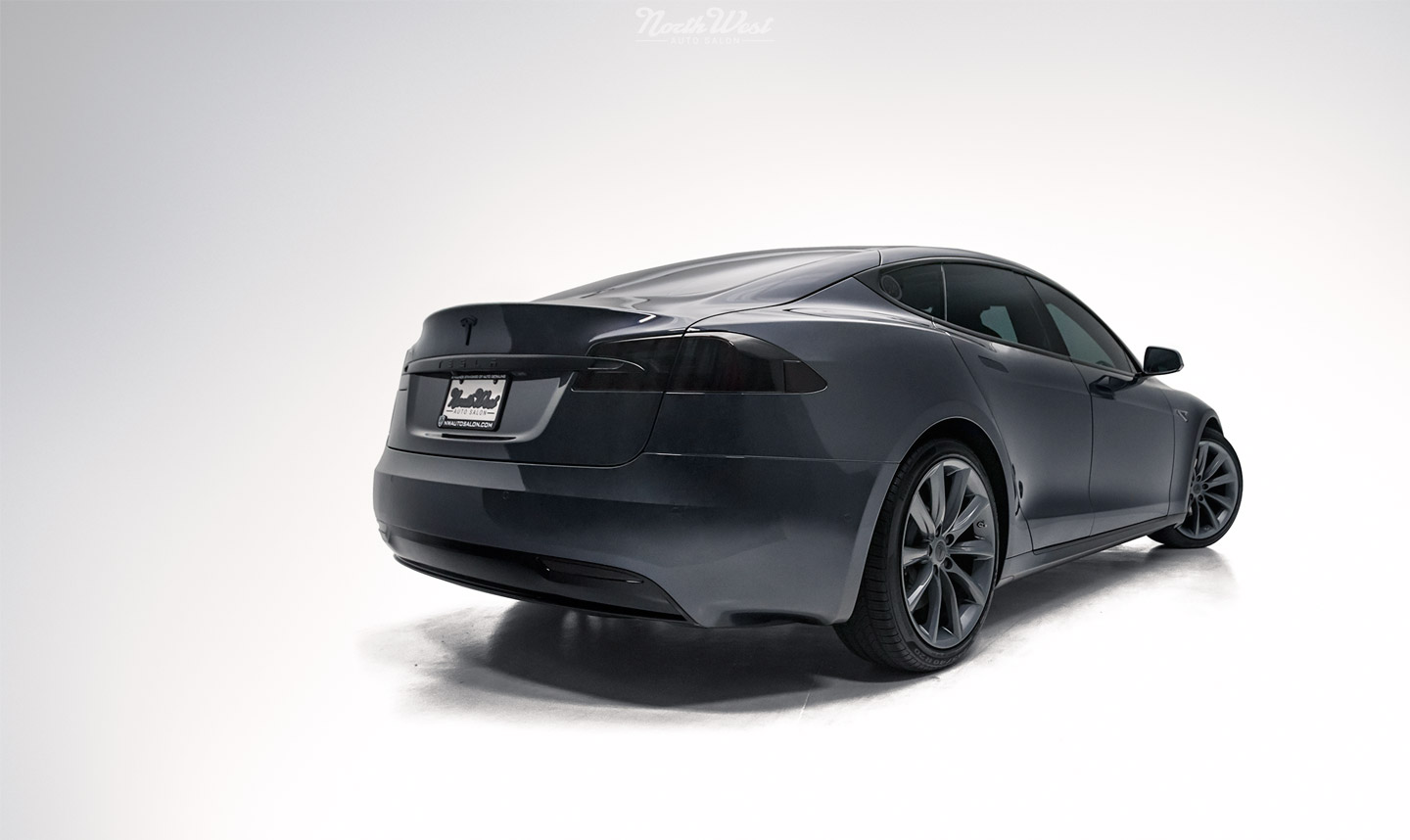 Tesla-Motors-Model-S-Facelifted-new-car-detail-xpel-chrome-delete-vinyl-wrap-rear-qtr.jpg