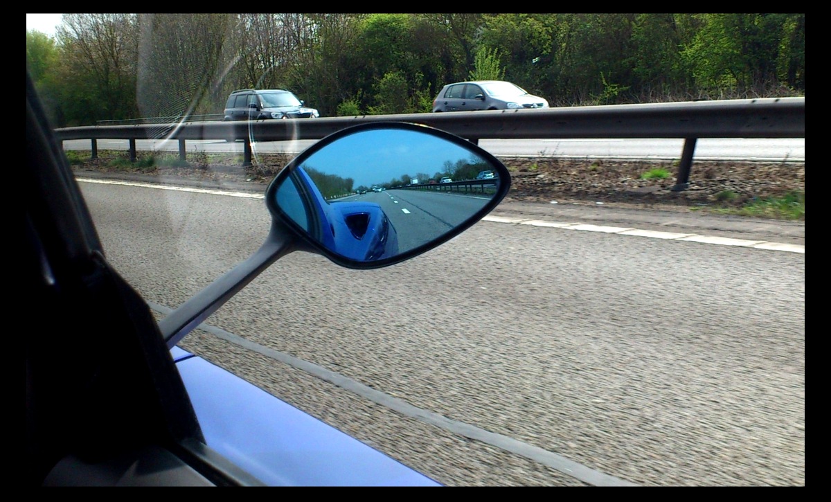 Tesla Roadster mirror view backwards.jpg