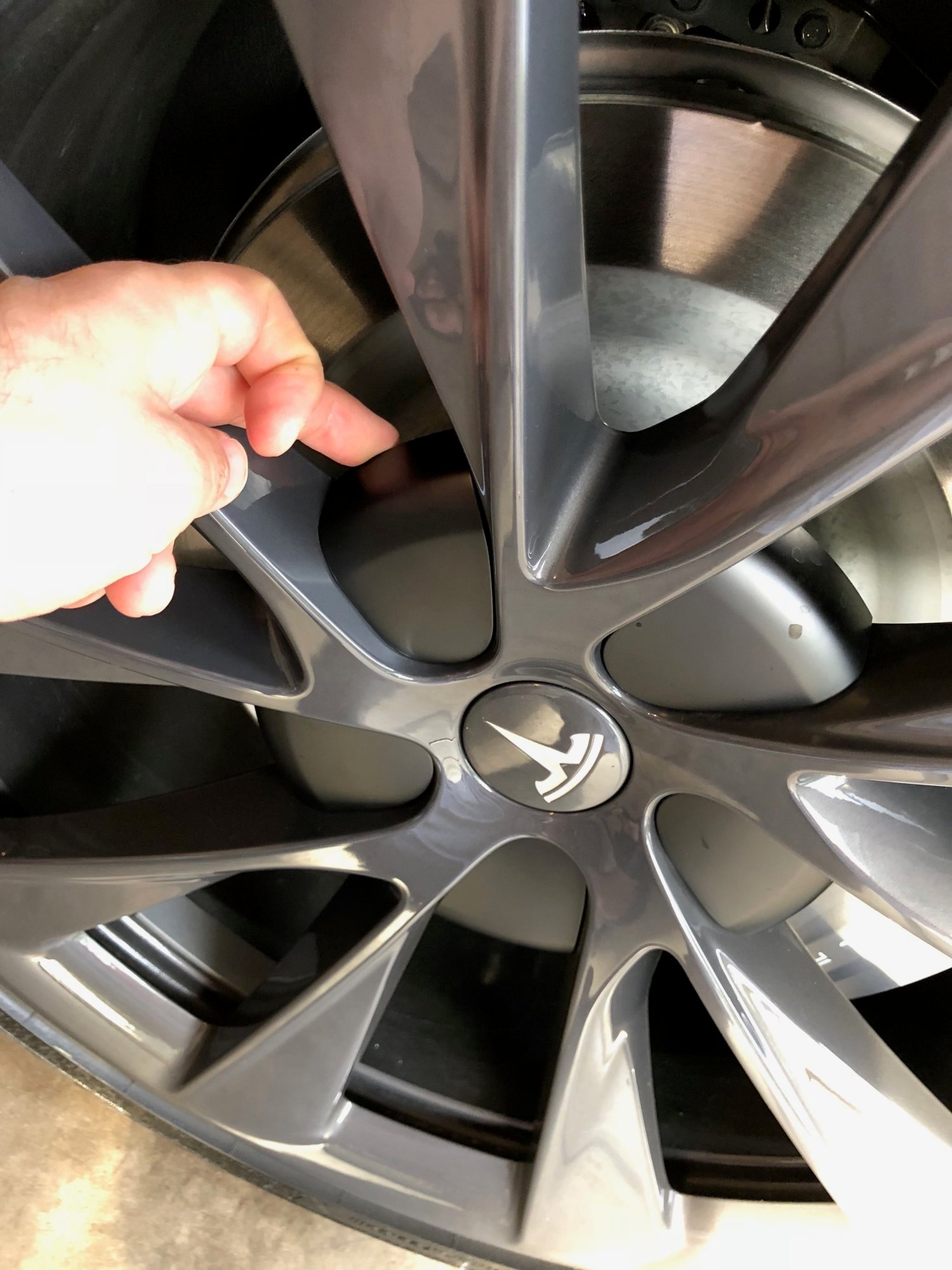 Anyone know how to remove lug nut covers? | Tesla Motors Club