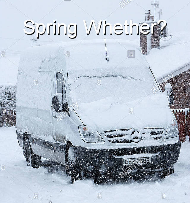 white-delivery-van-stuck-in-snow.jpg