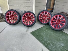 Red Tesla Model X red wheels and tires