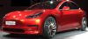 Tesla-Model-3-on-stage-in-red.jpg