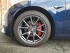 Tesla painted calipers front.jpg