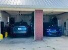 Tesla and Bolt in garage.jpeg