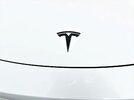 Much better! M-Black `metal` Tesla `T` (especially on white).JPG